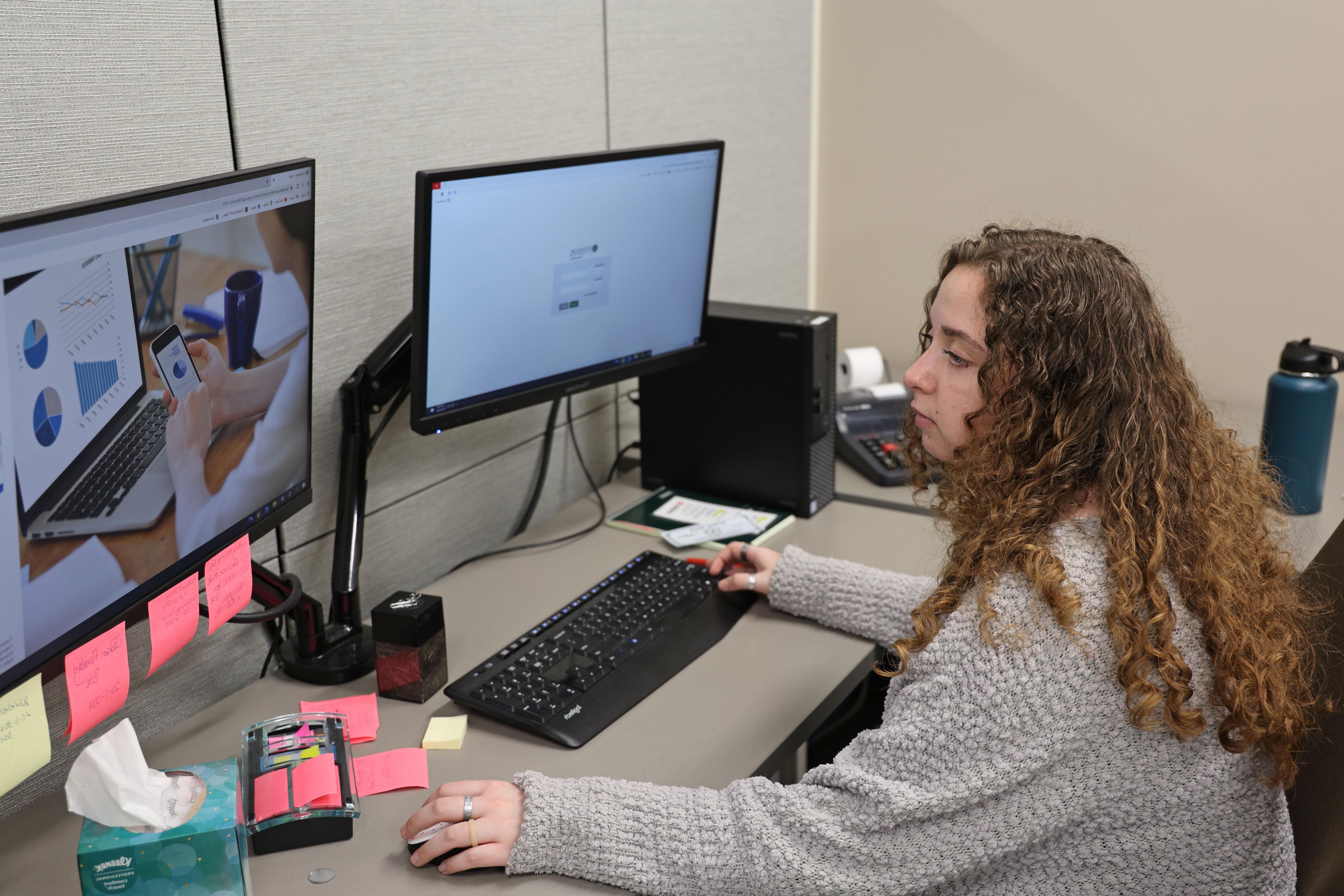 Faith working at her office space